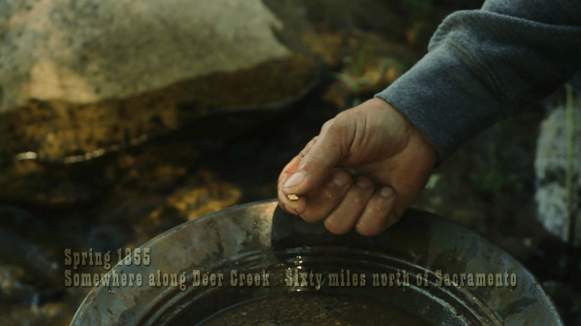 A gold pan and a nugget of gold Somewhere along Deer Creek in THE GOLdEN TREE (2010).